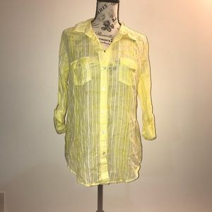 Bright yellow button down blouse